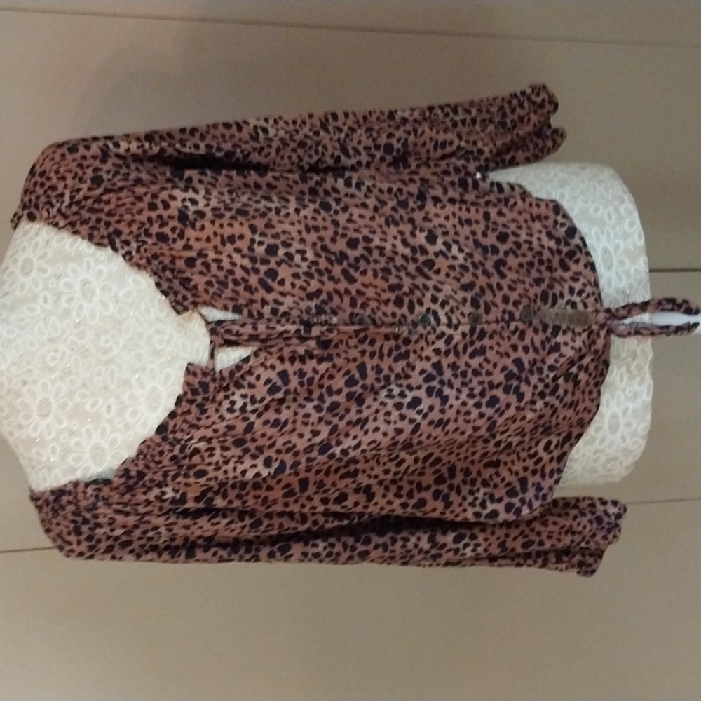 Rewind animal print off shoulder top. Size medium.